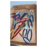 Flat of slip joint pliers , regular pliers and