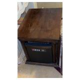 Portable heater on wheels in basement