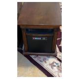 Portable heater on wheels in basement