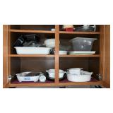 Cupboard of Corning ware casserole dishes and