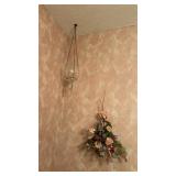 Faux flowers , toilet paper holder , towels and