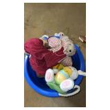 Tub of miscellanious toys  in basement