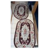 2 small area rugs  approximately  50 x 30"