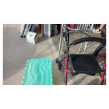 2 foldable walkers and a tote