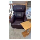 Brown leather recliner and side table