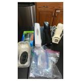 Saran Wrap holders ,  salad shooter  and more