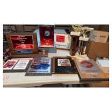 10 trophies and plaques from various car shows