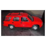 Redbox 1994 GMC Jimmy with a roof rack