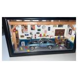 Diecast model of a 1963 Chevy Corvette stingray.