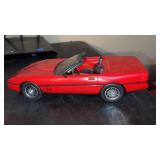 Plastic red corvette convertible toy car