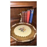 Nice grouping of brass color decor and books