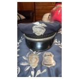Security officer hat and badge and Lincoln police