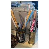 2 umbrella holders , umbrellas and more