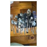 Miscellaneous silverware and holder