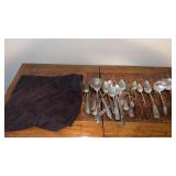 Silverplate utensils in bag