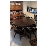Round dark wood parlor/poker style table with 6
