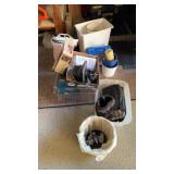 Miscellaneous grouping of trash cans , flower