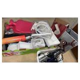 Curling irons , blow dryers and more