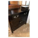 Vintage black cabinet on rollers 27 tall 30
