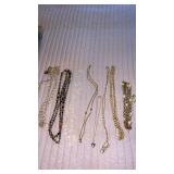 Gold tone necklaces