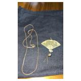 Gold tone, necklace, and pendant