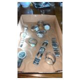 Group of menï¿½s and womanï¿½s watches