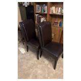 Two Brown chairs vinyl is peeling on them