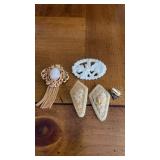 Celluloid clip earrings one of the clips is off