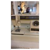 Singer, sewing machine and travel case