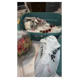 Tote with lid full of Christmas decorations and