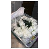 Tote full of faux flowers and tote of Christmas