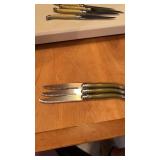 3 very nice Laquiole steak knifes green handle