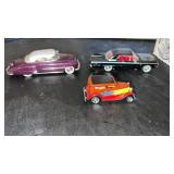 2 diecast 1/43 scale cars and  more