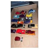 18 miscellaneous diecast cars . 1:64 scale