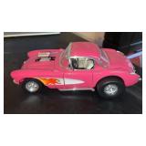Road legends, pink 1957 Chevy Corvette gasser