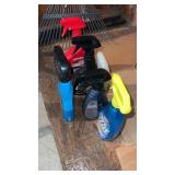Partial bottles of  car cleaning products