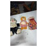 Old panda bear and bear stuffed animals with doll
