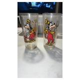 To Walt Disney Pepsi glasses with goofy on them