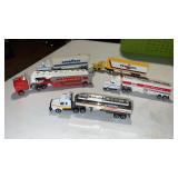 5 Road champs, semi trucks and trailers