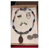 Silver tone clip earrings and necklace