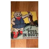 The pop-up Puss in boots book all pop-ups intact