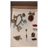 Gold tone bracelet and pins /brooches