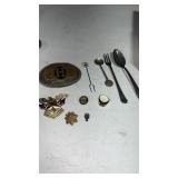 Miscellaneous lot of military pins, belt, buckle