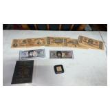 Fake currency notes , coin book and tape measure