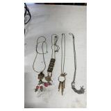 Gold tone  and silver tone  necklaces