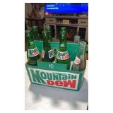 6 Mountain Dew, glass bottles, two Dr Pepper,