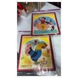 2 magnetic inlaid plastic puzzles