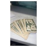 Vintage pile of toy money that ain