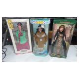 2 NIP Barbie dolls, and 1  dolls of the world