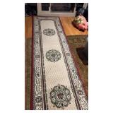 Runner rug approximately  9